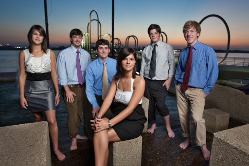 Red Six Media was founded by six Louisiana State University graduates. Majority owner and creator, Kristen Morrison, center, is joined by partners, from left, Kayla Morrison, Matt Dardenne, Trey Bartsch, Joe Martin and James Spencer at the Red Stick Fountain on the MIssissippi River levee in Baton Rouge.